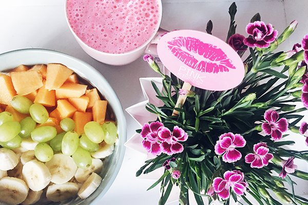 a bowl of fresh fruits and cheese, a pot of strwaberry milk and Pink Kisses with Friendstick